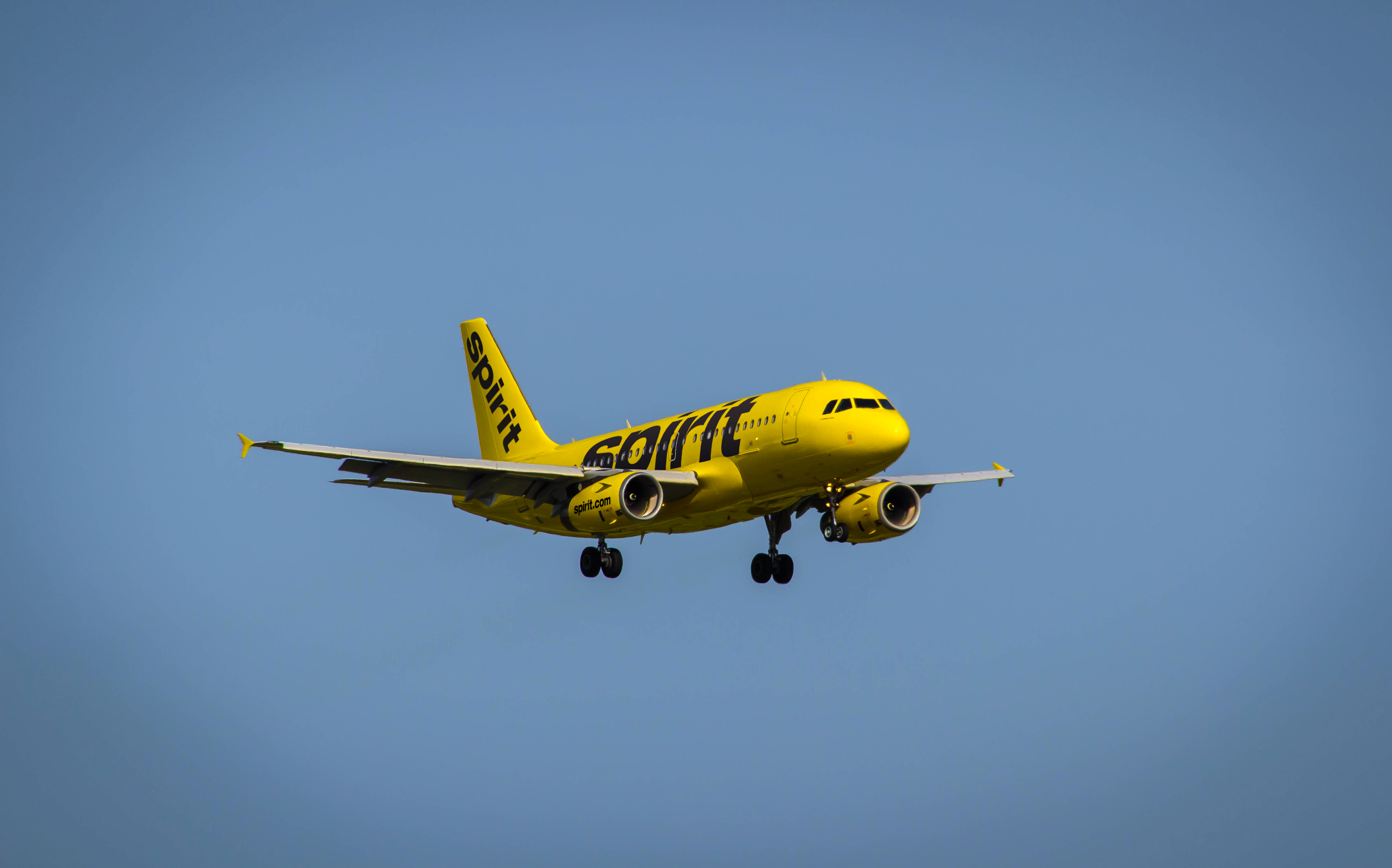 spirit airlines cost to check bag