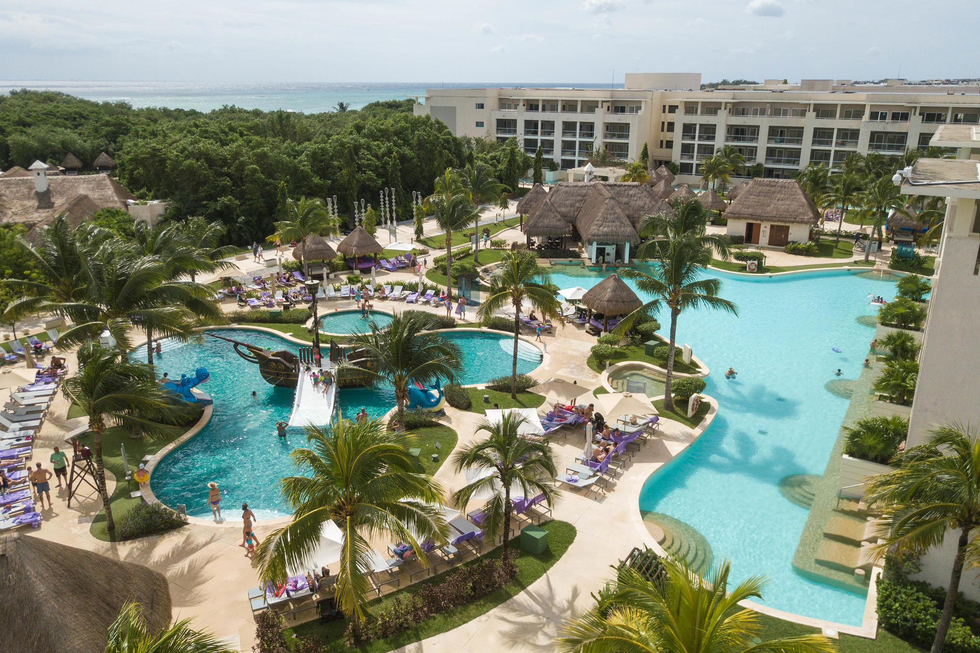 The pool and kids' splash area at Paradisus Playa del Carmen La Esmeralda