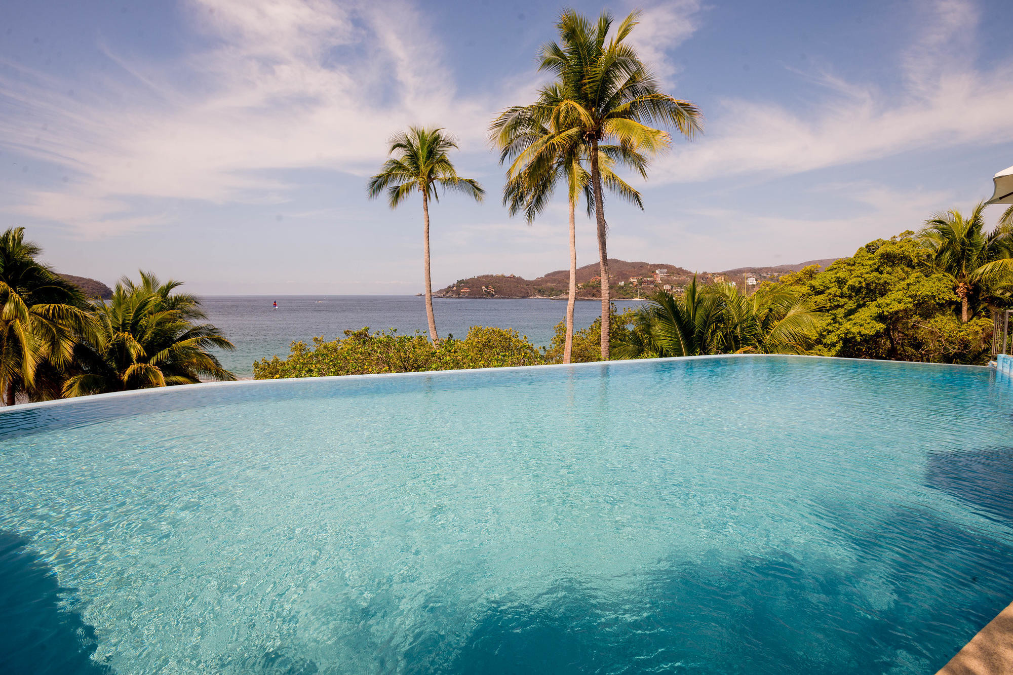 The pool and bay view at Catalina Beach Resort in Zihuatanejo/Oyster