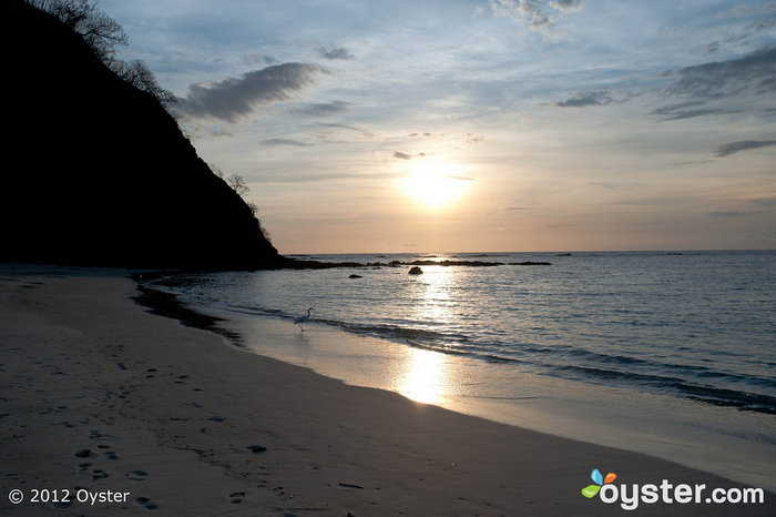 Pôr do sol na praia de Playa Virador no Four Seasons