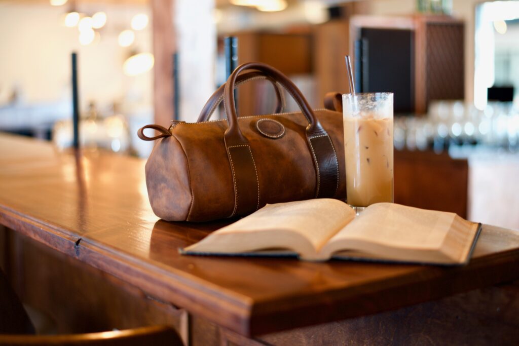 Bag, book and ice coffee