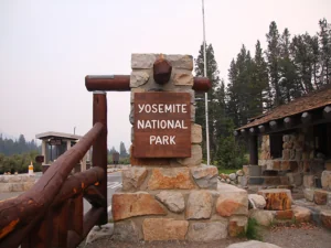 Stones and wood Yosemite National Park entrance sign